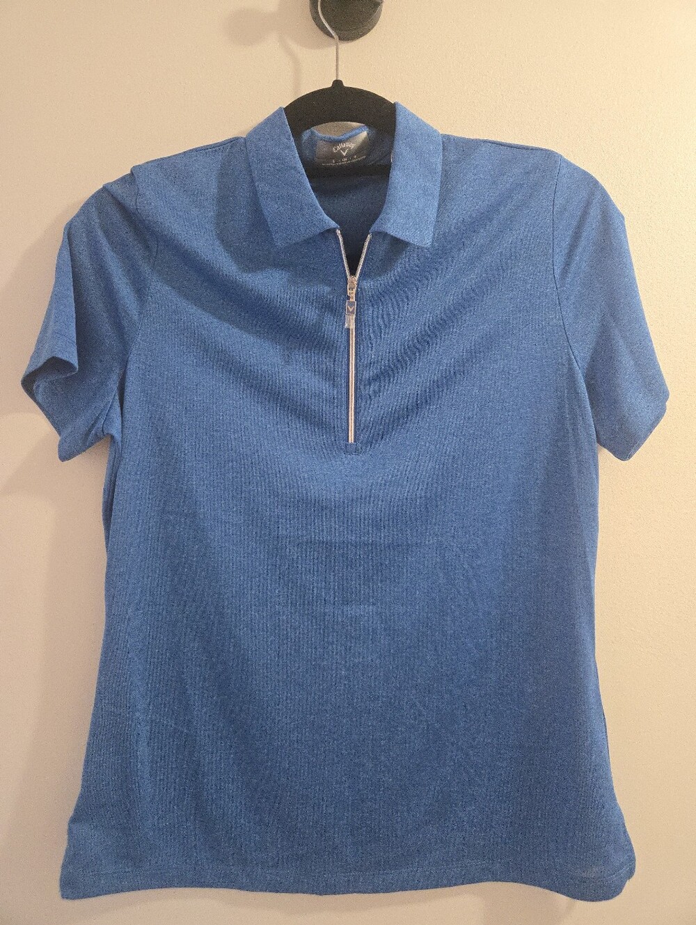 Callaway women’s short sleeve golf polo in size Small.